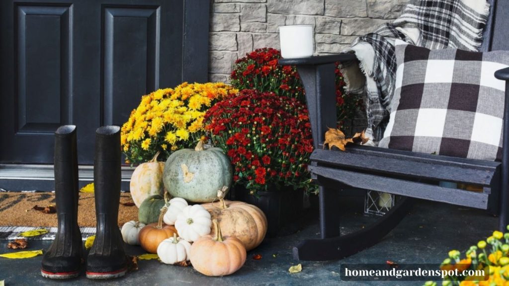 decorative fall mums on front porch